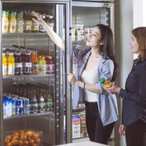 Two women shopping in a Canteen market