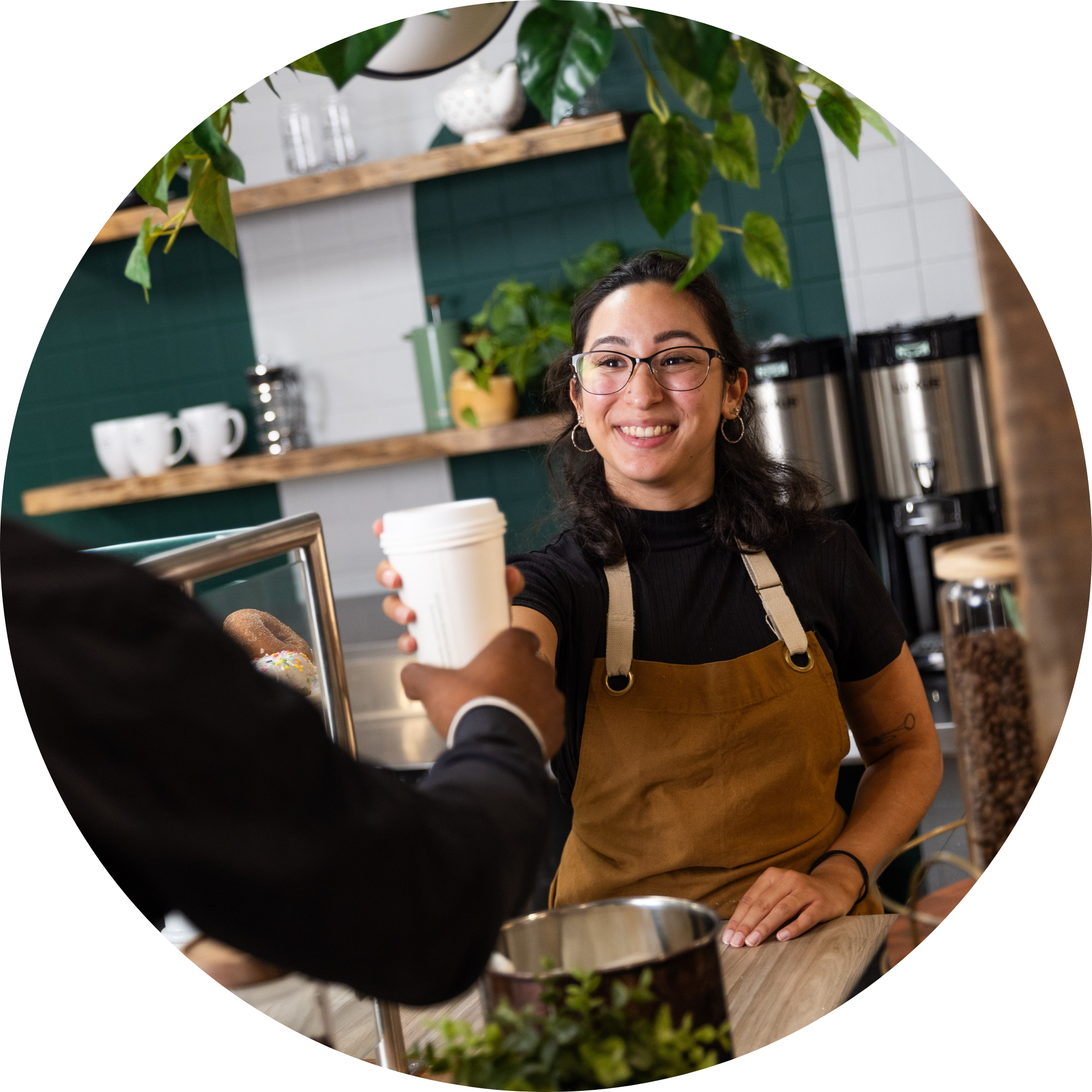 Barista Handing Customer Coffee Circle (1) Barista handing customer coffee, barista training, customer experience, coffee and tea
