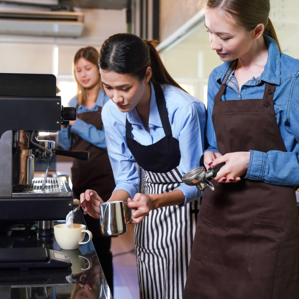 Baristas Using Espresso Machine Baristas making coffee, barista training, espresso machine equipment