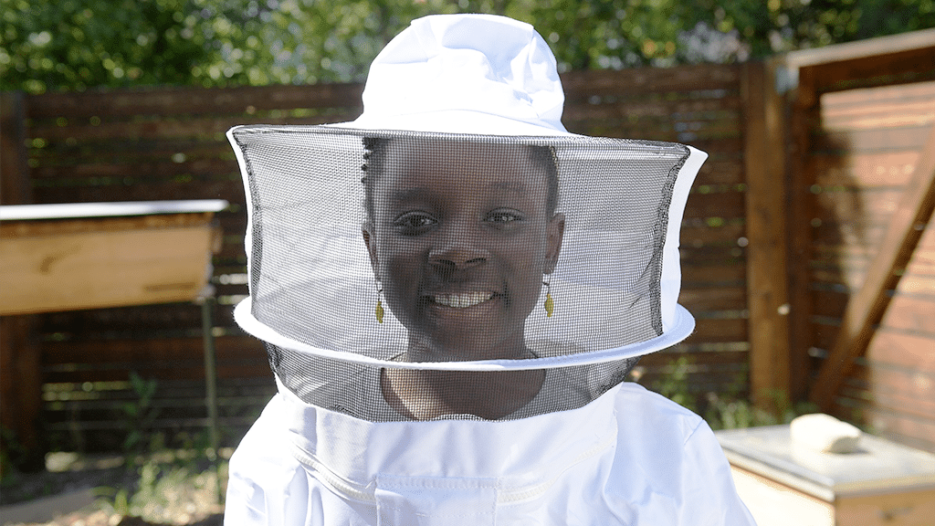 Mikailia Ulmer, founder of Me & the Bees Lemonade, beekeeping