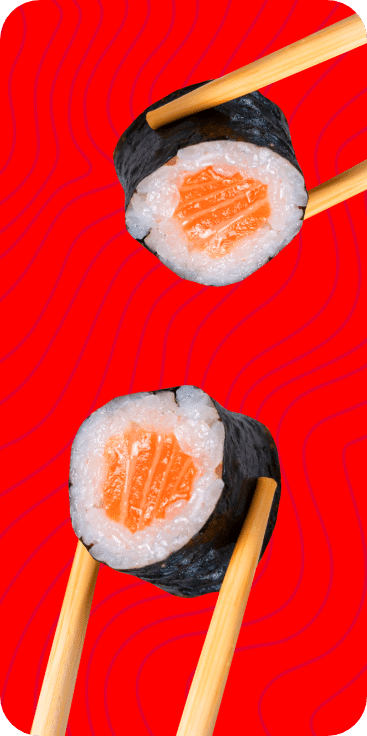 Salmon sushi in chopsticks, red background