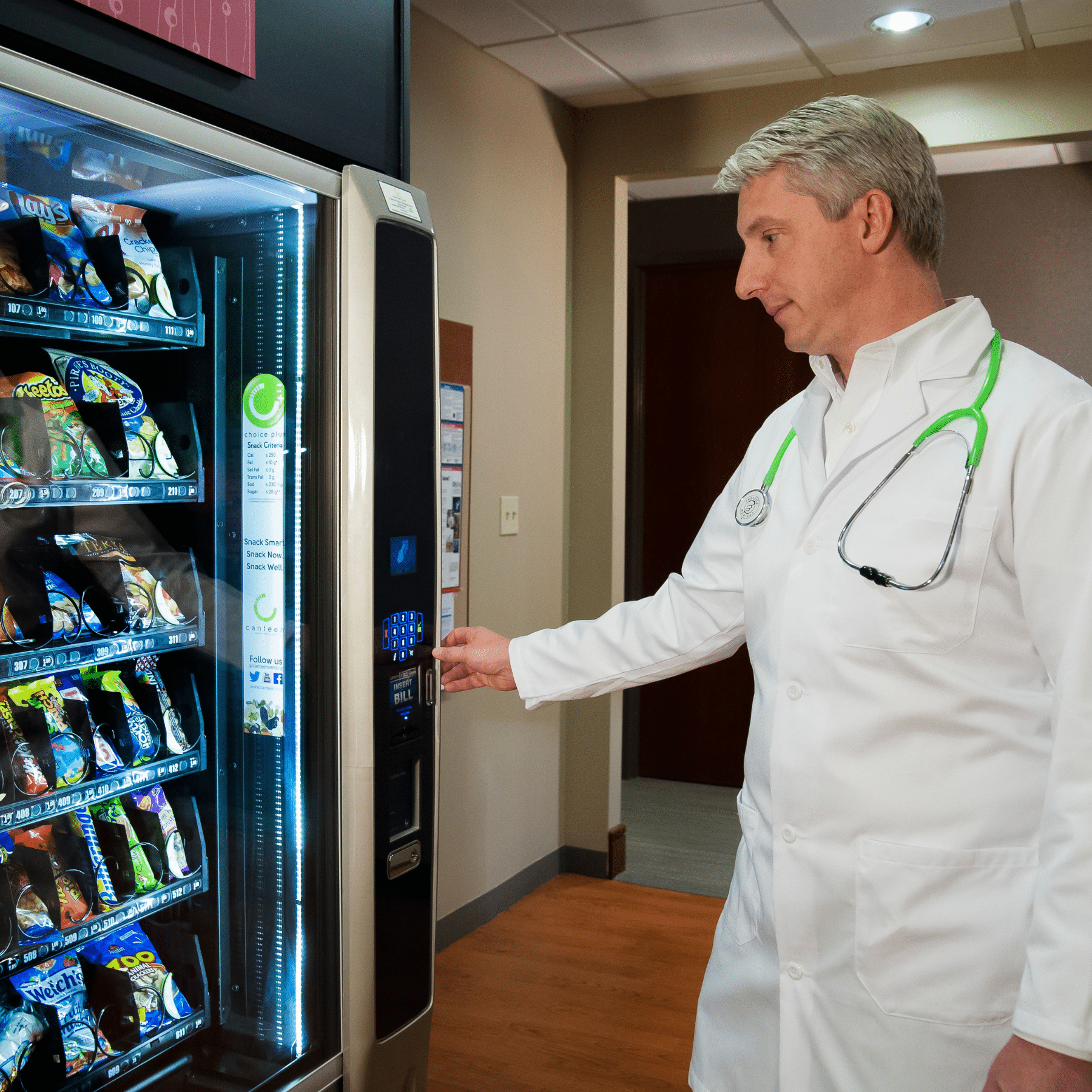 Male doctor using a Canteen vending machine